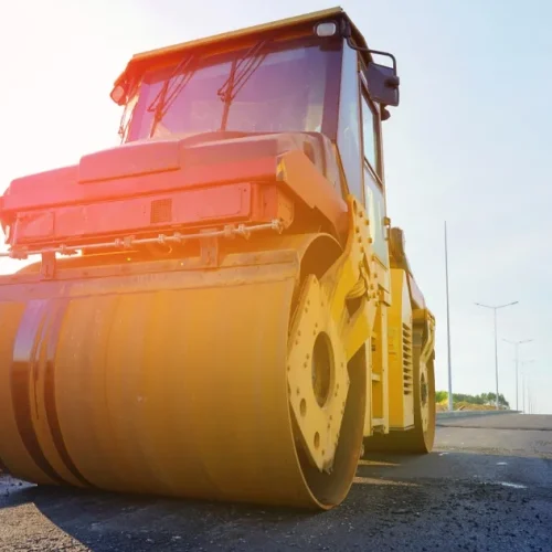 Asphalt,Road,Roller,On,Road,Construction.,Steamroller,,Vibration,Roller,Compactor